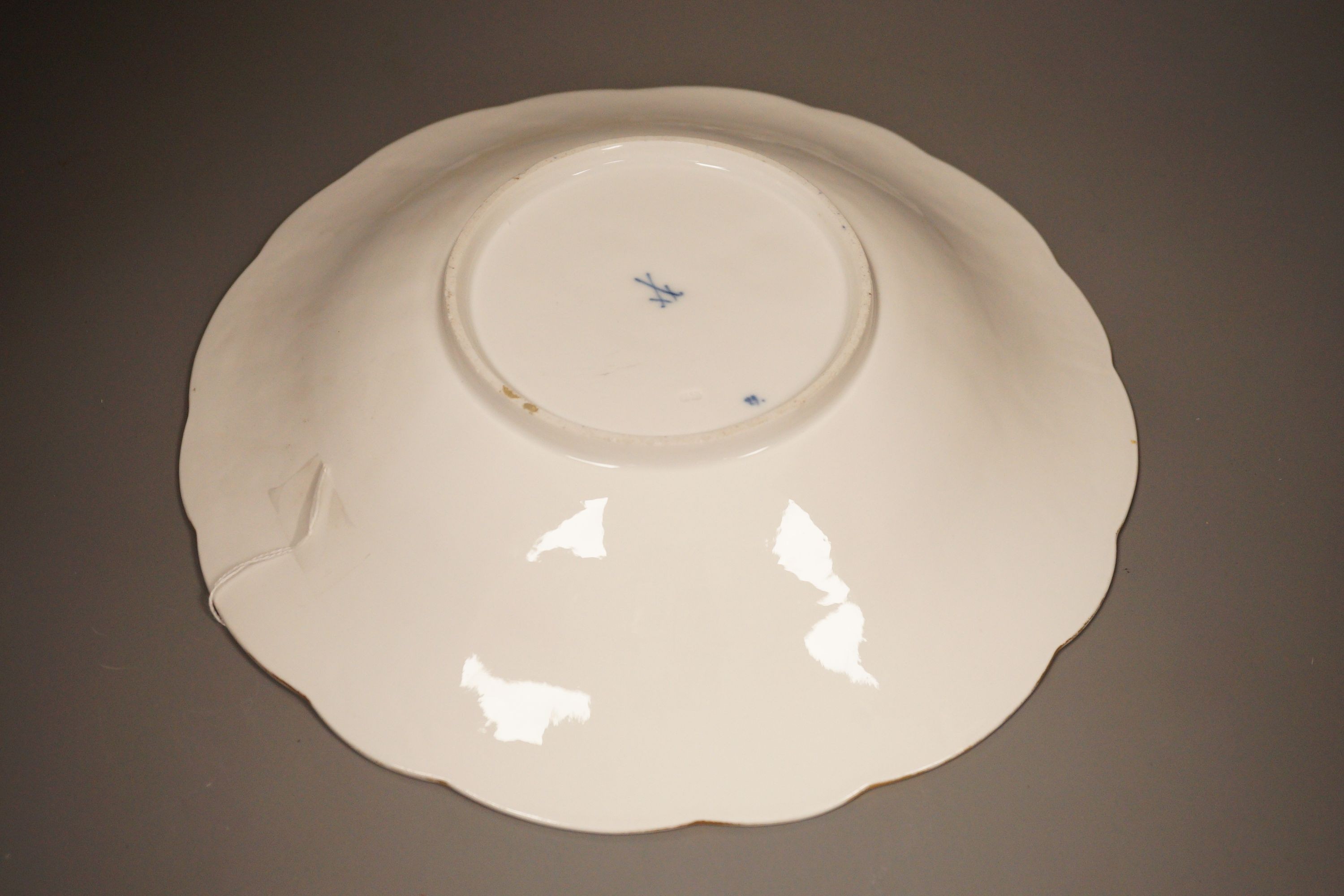 A late 19th century Meissen floral gilt and blue dish, 29cm